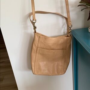 Tan Leather Shoulder Bag with Adjustable Strap and Slouchy Design